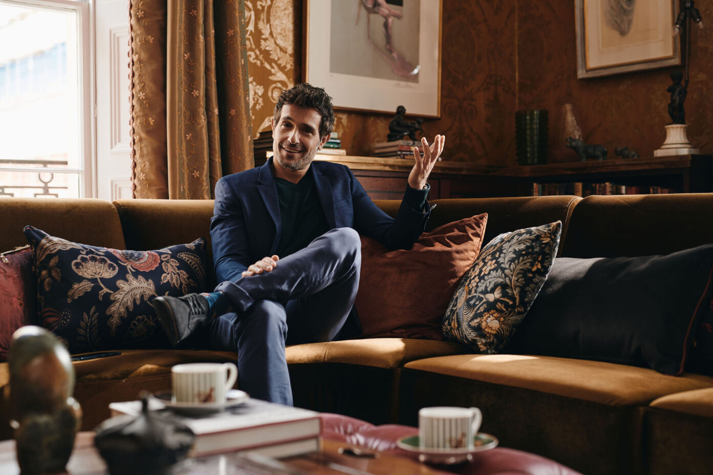 man sitting on sofa