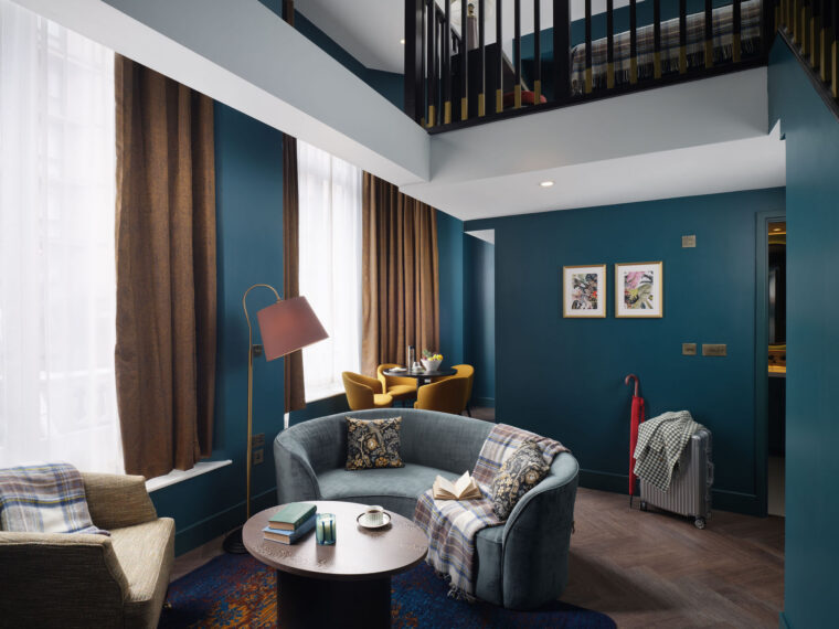 image of a living room with floor to ceiling windows